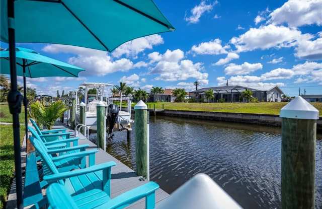 FURNISHED SHORT TERM RENTAL - 3 Bed / 2 Bath - Single Family Pool Home - $5,000/month ** Heated Swimming Pool ** Canal View Gallery 3