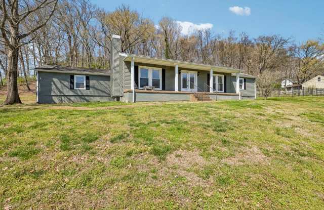 Experience the perfect blend of privacy and open space in this beautifully maintained 3-bedroom, 2.5-bath ranch home photos photos