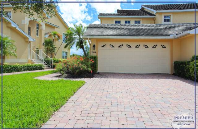 ***THE STRAND***GOLF MEMBERSHIP AVAILABLE***2 BED / 2 BATH plus den***2 CAR GARAGE***GOLF COURSE / WATER VIEW*** - 5892 3 Iron Drive, Collier County, FL 34110