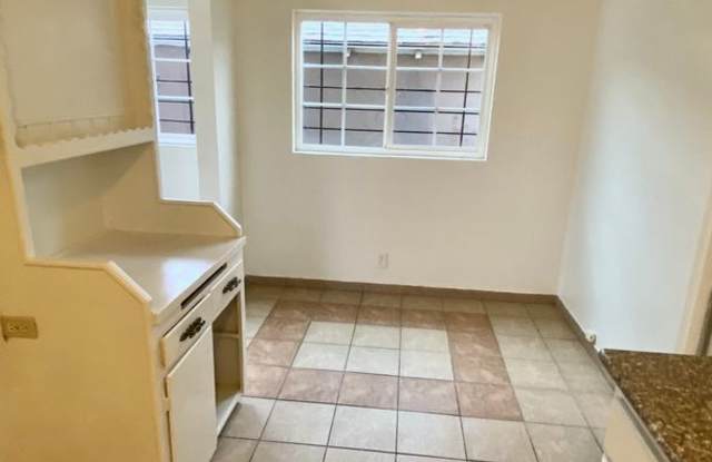 NEW RECUDED PRICE!!! Welcome to the heart of Bakersfield, where this charming duplex is ready to become your new home! Gallery 4