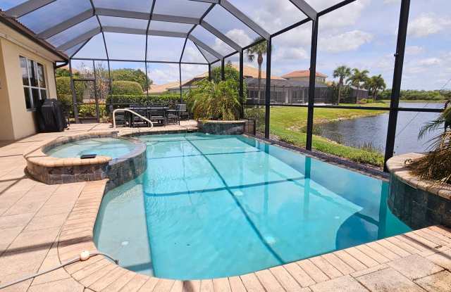 Seasonal Short-Term 4 Bedroom 3 Bathroom Heated Pool Home located in Venetian Golf & River Club! Gallery 4