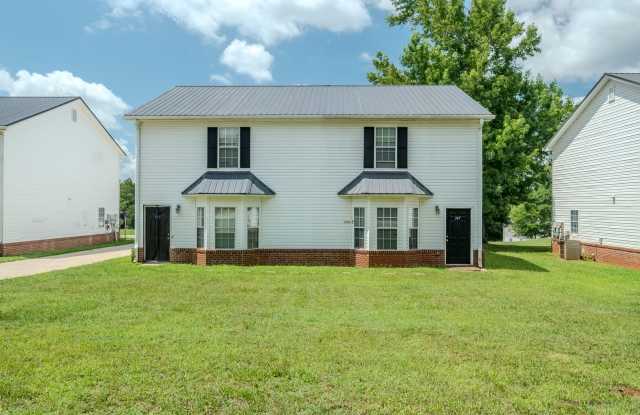 Spacious 4BR/3BA Townhome | Pet Friendly | Washer & Dryer Included | $1,600/mo photos photos