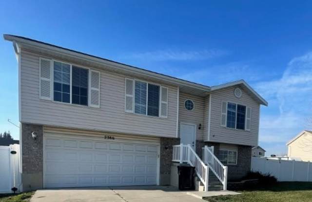 Your New Chapter Starts Here – 5 Bed, 2 Bath Syracuse Home + 2 Weeks Free! - 2386 South 2830 West, Syracuse, UT 84075