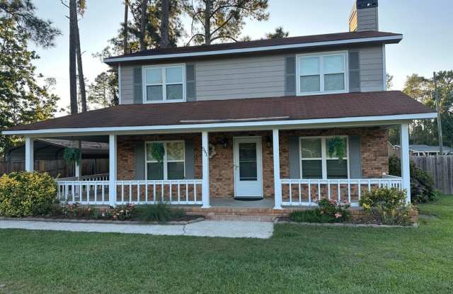Move-In Ready Corner-Lot Home with Wraparound Porch Near Fort Eisenhower Gallery 1