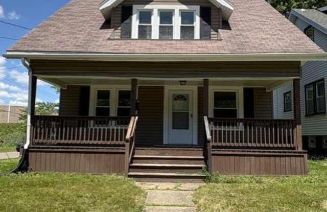 Comfortable Akron Home with Covered Front Porch, Dining Room & 2-Car Garage photos photos