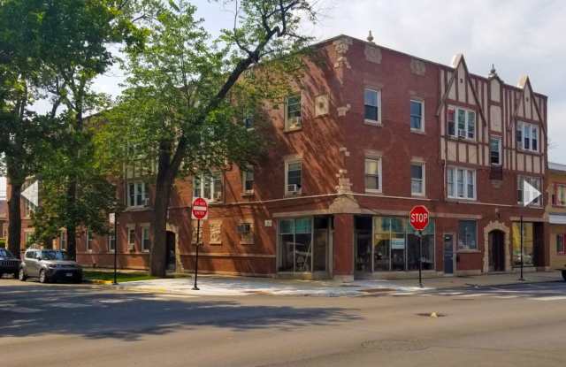 Condo with free heat! In-unit laundry, hardwoods, more! photos photos