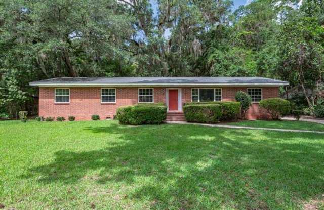 GORGEOUS 3/2 with Plank Floors, Carport, Fenced in Yard, Screened in Porch, Stainless Appliance& More! $1900/month Avail Now! Gallery 1