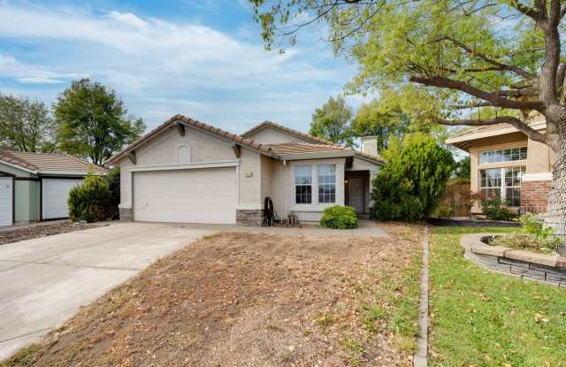 3-Bedroom Citrus Heights Home with Vaulted Ceilings, Fireplace & 2-Car Garage! photos photos