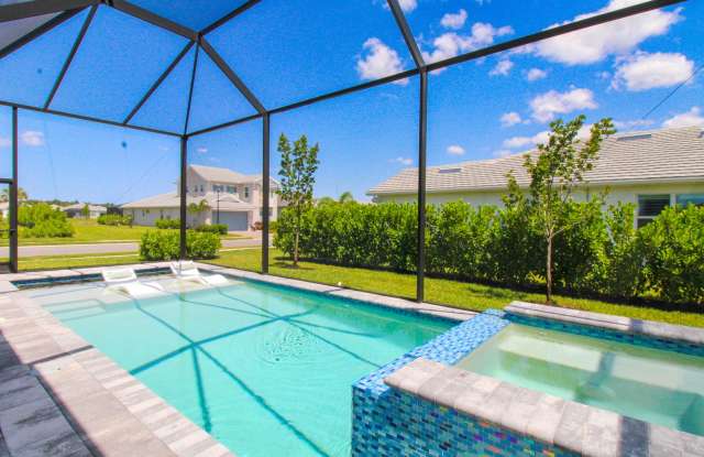 ** 2023 NEW CONSTRUCTION STUNNING SINGLE FAMILY PRIVATE HEATED SALTWATER  SPA POOL HOME 3-BEDROOM PLUS DEN\2.5 BATH AT AZURE AT HACIENDA LAKES ** UNFURNISHED HOME ** FURNITURE IS ONLY FOR STAGING PURPOSES AND WILL BE REMOVED **LONG-TERM TENANT ** - 9241 Cayman Drive, Collier County, FL 34114