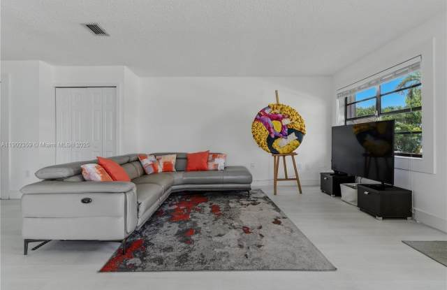 6825 NW 169th St - 6825 Northwest 169th Street, Country Club, FL 33015