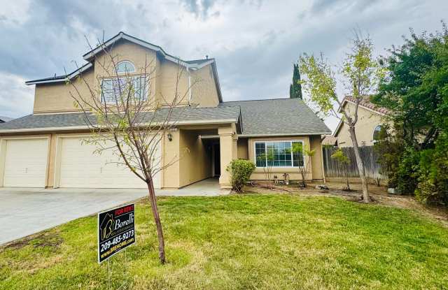 REDUCED!!! 4 Bedroom, 3 Bath Tri-Level Home with NEW UPGRADES! - 1021 Woodbridge Street, Los Banos, CA 93635