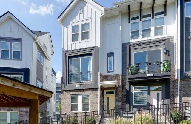 Almost brand new and stunning end unit and modern town home with everything you could want! Gallery 1