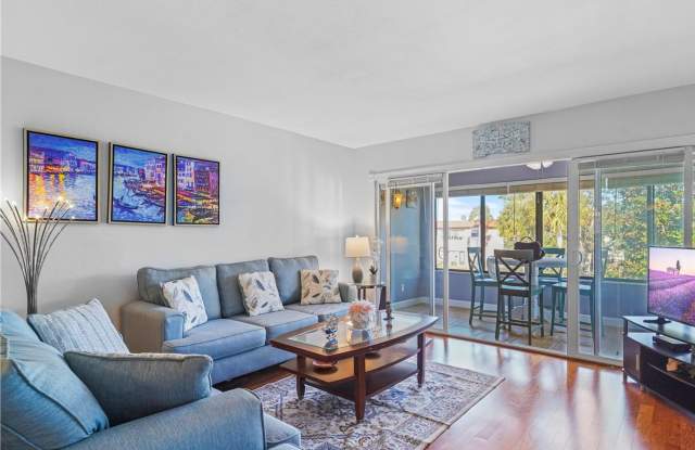 Bright Furnished End-Unit Condo Overlooking the Pond - 1750 Belleair Forest Drive, Belleair, FL 33756