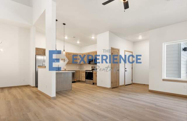 Brand-New 3-Bedroom Townhome with Lofted Living Space! Gallery 1