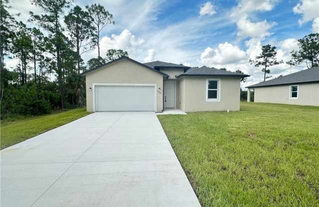 568 Woodview Drive - 568 Woodview Drive, Lehigh Acres, FL 33972