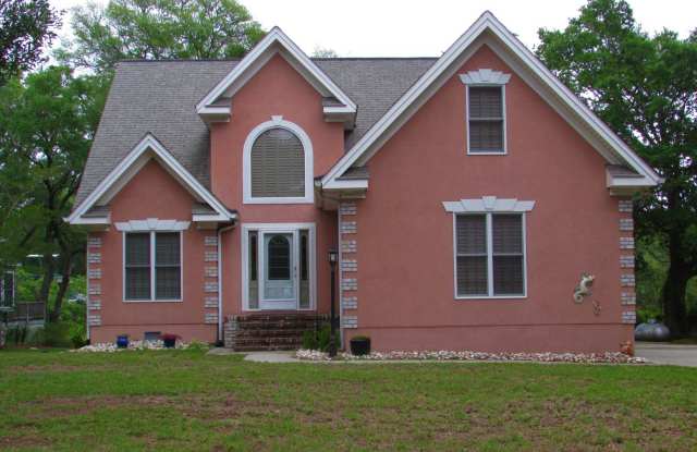 Property located in Schnooers Pointe- 3 bedroom 2.5 bathroom with a loft area - 1903 Norwood Street Southwest, Brunswick County, NC 28469
