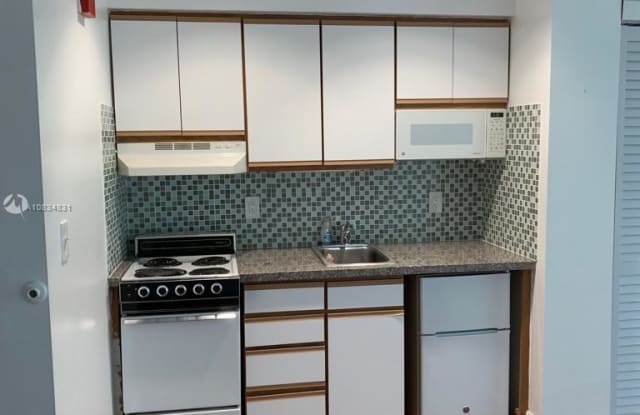 5787 SW 72 ST - 5787 Sunset Dr, South Miami, FL 33143