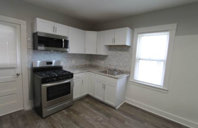 Two Bedroom Home priced right! Off street parking! Large yard. photos photos