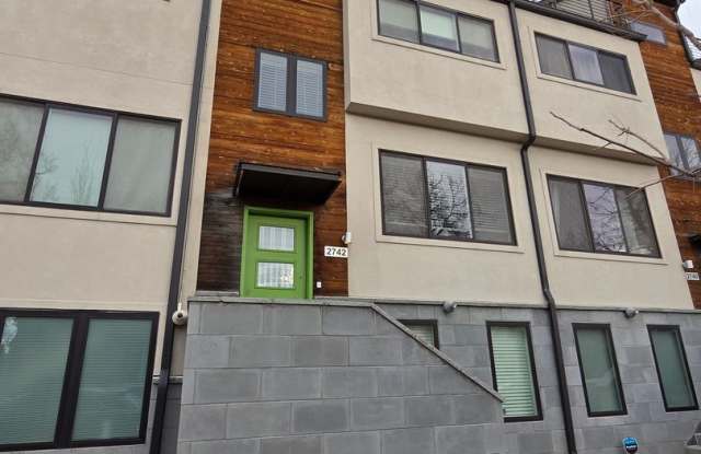 STUNNING 4-LEVEL TOWNHOME IN HIGHLANDS WITH SAUNA, 2-CAR GARAGE + AMAZING ROOFTOP DECK! photos photos