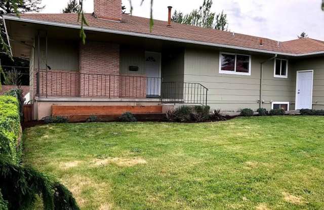 Spacious 4 Bedroom Home with Granite Kitchen, Main-Level Primary Suite, Two Living Areas & Outdoor Patio Gallery 3