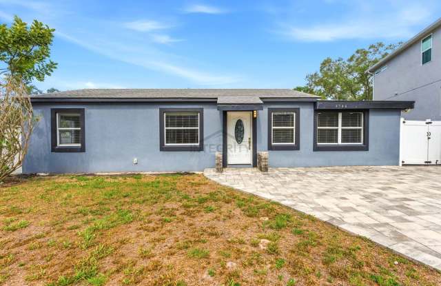 4 Bed/2 Bath, 1,360 Sqft - 4746 W Anita Blvd Tampa, FL 33611 photos photos