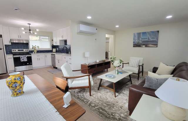 Beautifully renovated single family home on extra-large lot with shop. Gallery 1