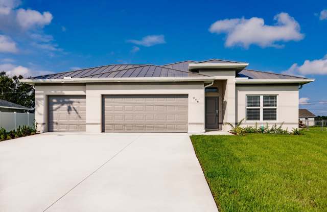 Brand-New Corner Lot Home with 3-Car Garage in Cape Coral! photos photos