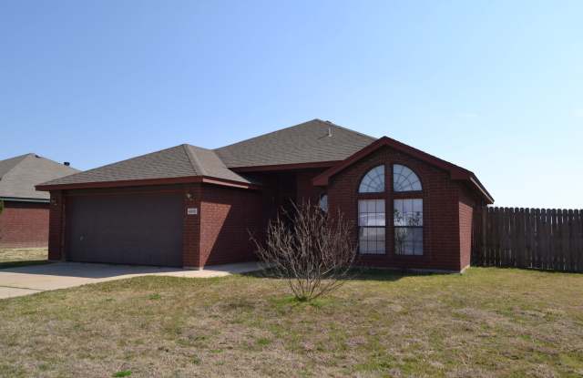 All brick beauty with fireplace and fenced yard! photos photos