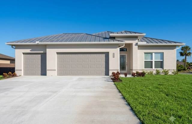 Brand-New Luxury Living in Cape Coral | 4 Bedrooms • 3-Car Garage • Move-In Ready! photos photos Brand-New Luxury Living in Cape Coral | 4 Bedrooms • 3-Car Garage • Move-In Ready! photos photos