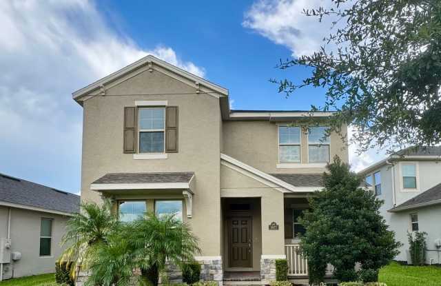 Large 4/3.5 Home located in Waterleigh! Downstairs Suite photos photos