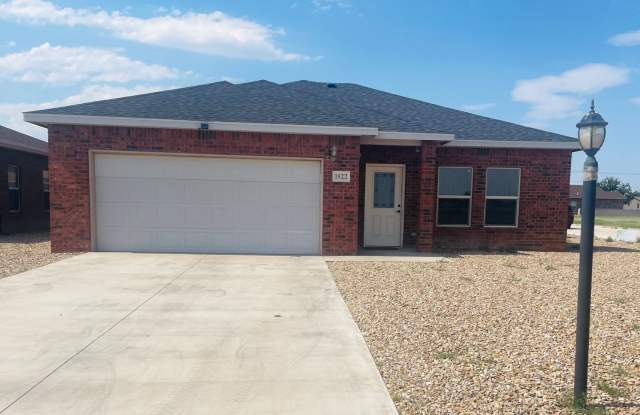 Your Ideal Home: 3 Large Bedrooms, 2 Bathrooms, and a 2-Car Garage! - 1822 Quail Wood Drive, Roosevelt County, NM 88130