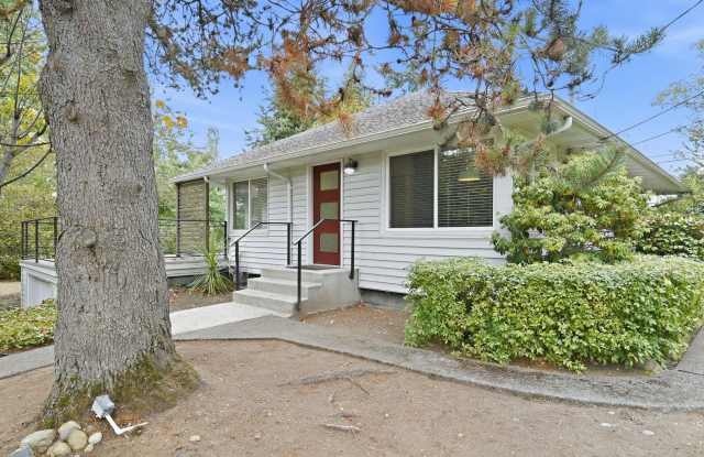 Private University Place Retreat with Deck, Gardens & Two Garages Gallery 4