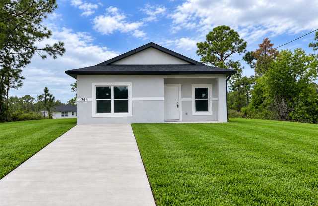 Bright & Modern 2 Bed-1 Bath Pet-Friendly Home in Desirable Lehigh Acres! photos photos