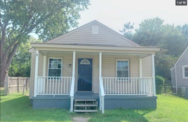 Super Cute 3 bed 2 bath Rancher with detached Garage and alley access. photos photos