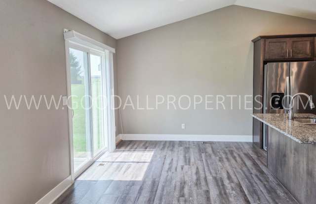 Price reduction $2,795 a month!! Spacious 4-Bedroom Clive Ranch with Finished Basement & 3-Car Garage Gallery 4