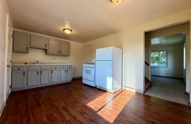 Charming Two Bedroom Townhome with a Private Basement & a Shared Backyard Space! Call Today! Gallery 2