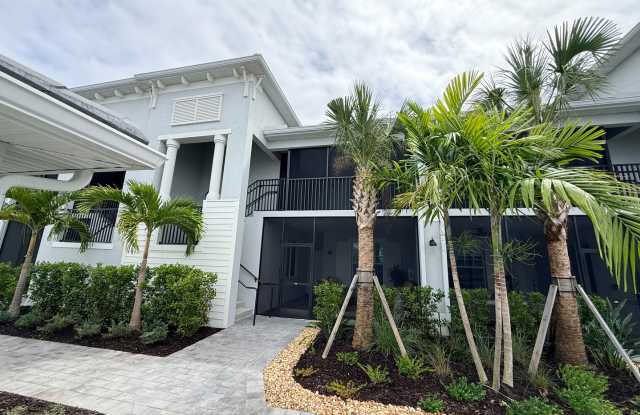 Beautifully Furnished Second-Floor Coach Home in the New Webb’s Reserve Golf & Country Club – Golf Transfer Available! photos photos