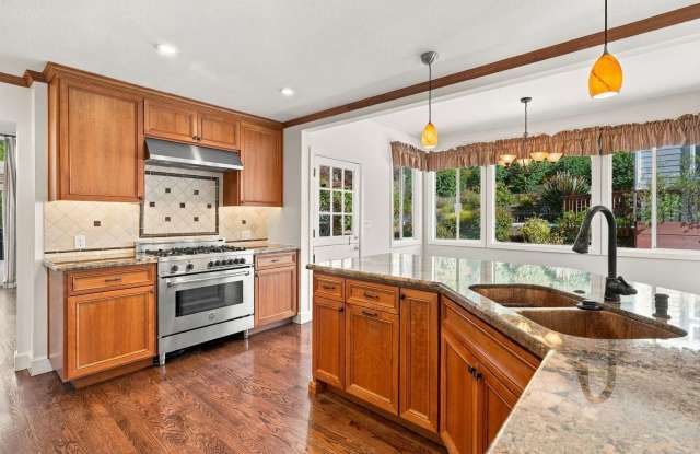 Redwood-Shaded Retreat with Vaulted Ceilings and Space to Spare photos photos