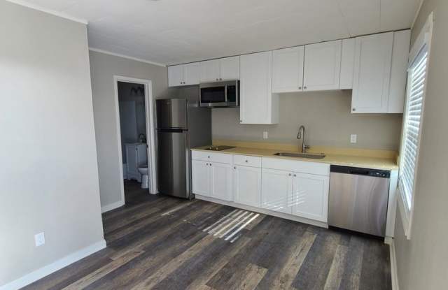 Recently Renovated Apartments, Featuring Modern Finishes, Stainless Appliances, Garage Space and Pet Friendly photos photos