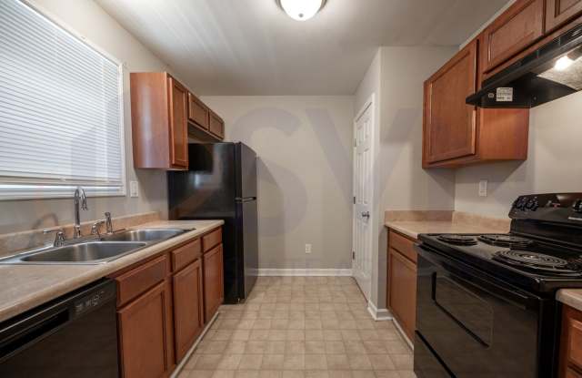 Welcome to this spacious 4-bedroom, 2.5-bathroom house located in Durham, NC photos photos