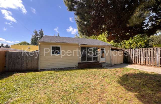 MOVE IN SPECIAL! CALL FOR DETAILS! Cozy Two Bedroom House with Large Yard photos photos