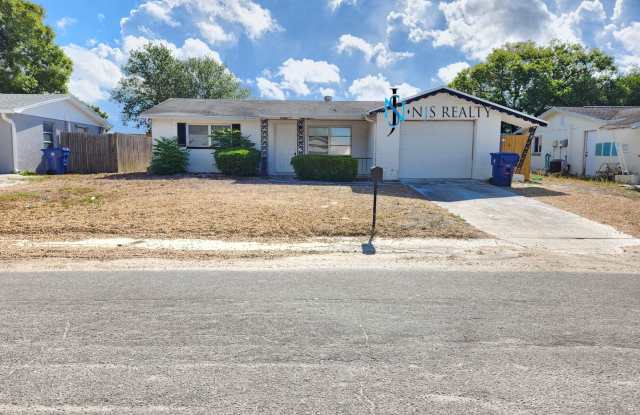 JUST REDUCED!!  Beautiful 2/2/1 1150 Sq. Ft. with BONUS ROOM!!... tile & luxury plank flooring, Frest paint and a large fenced in yard! Gallery 3