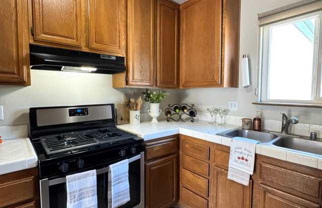 Charming 2 bed 1.5 bath condo, with attached 2 car garage! photos photos