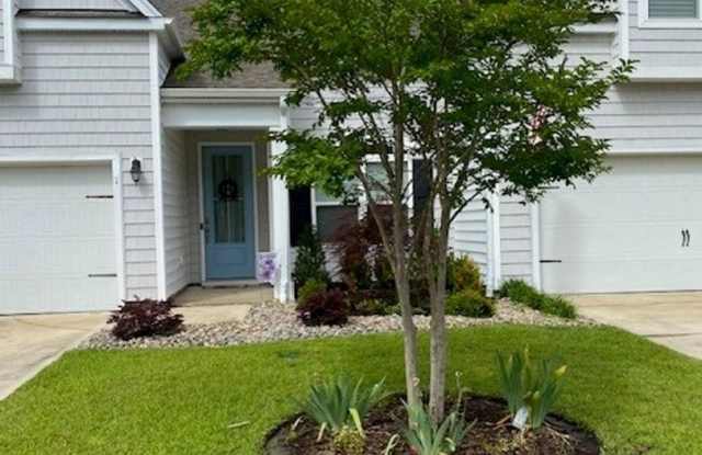 Welcome to this fully furnished 3-bedroom, 3-bathroom townhouse located in the vibrant Hawkeswater community. photos photos