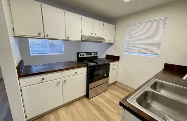 DESIRABLE MILLWOOD NEIGHBORHOOD ON TREE LINED STREET photos photos