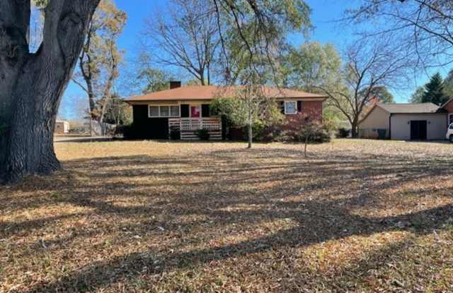 Adorable 3-bed 2-bath brick ranch, sitting on nearly a half acre lot, is located in Gastonia photos photos
