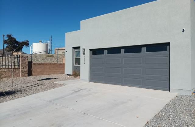 Newly-renovated 3 bedroom, 2 bathroom in Los Lunas! All new appliances! HUGE yard! Showings available NOW! Gallery 3