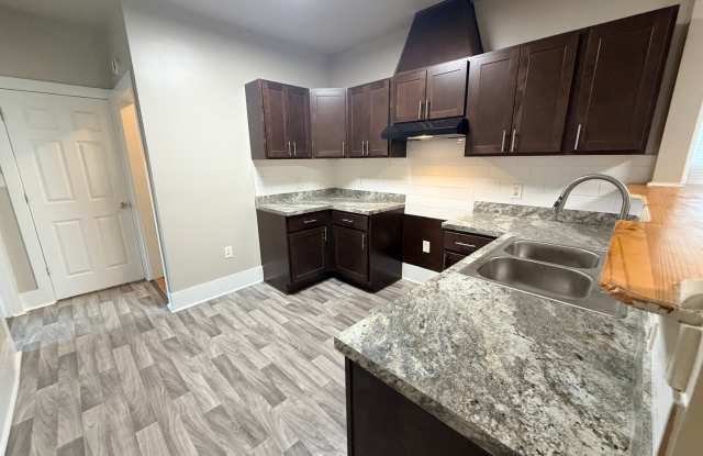 Renovated Open Concept 5BR/2BA Rent to Own Home with Garage Gallery 3