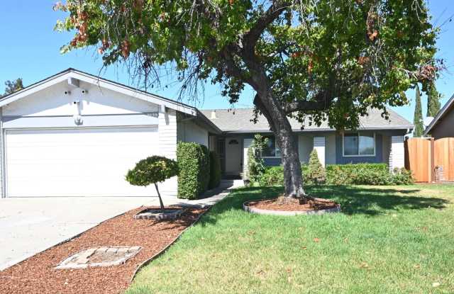Welcome Home! Bright 3 Bed, 2 Bath House with 2-Car Garage on 5659 Lathrop Dr. photos photos