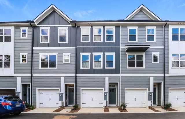 Beautiful 3BR 3.5BA Townhome w/ Full Appliance Kitchen • Garage Parking in West End photos photos